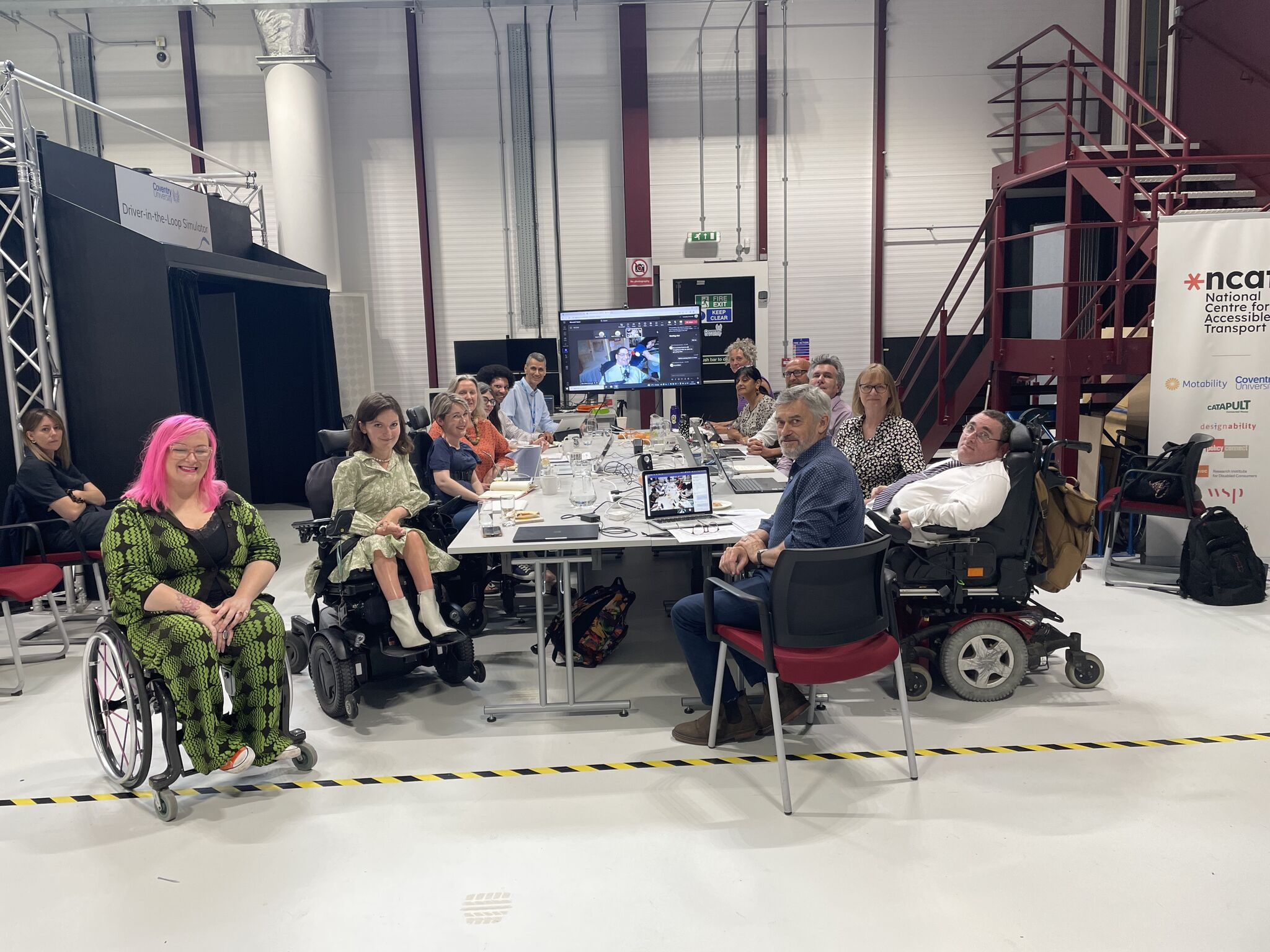 ncat board members pictured around a table in the Coventry University studio space