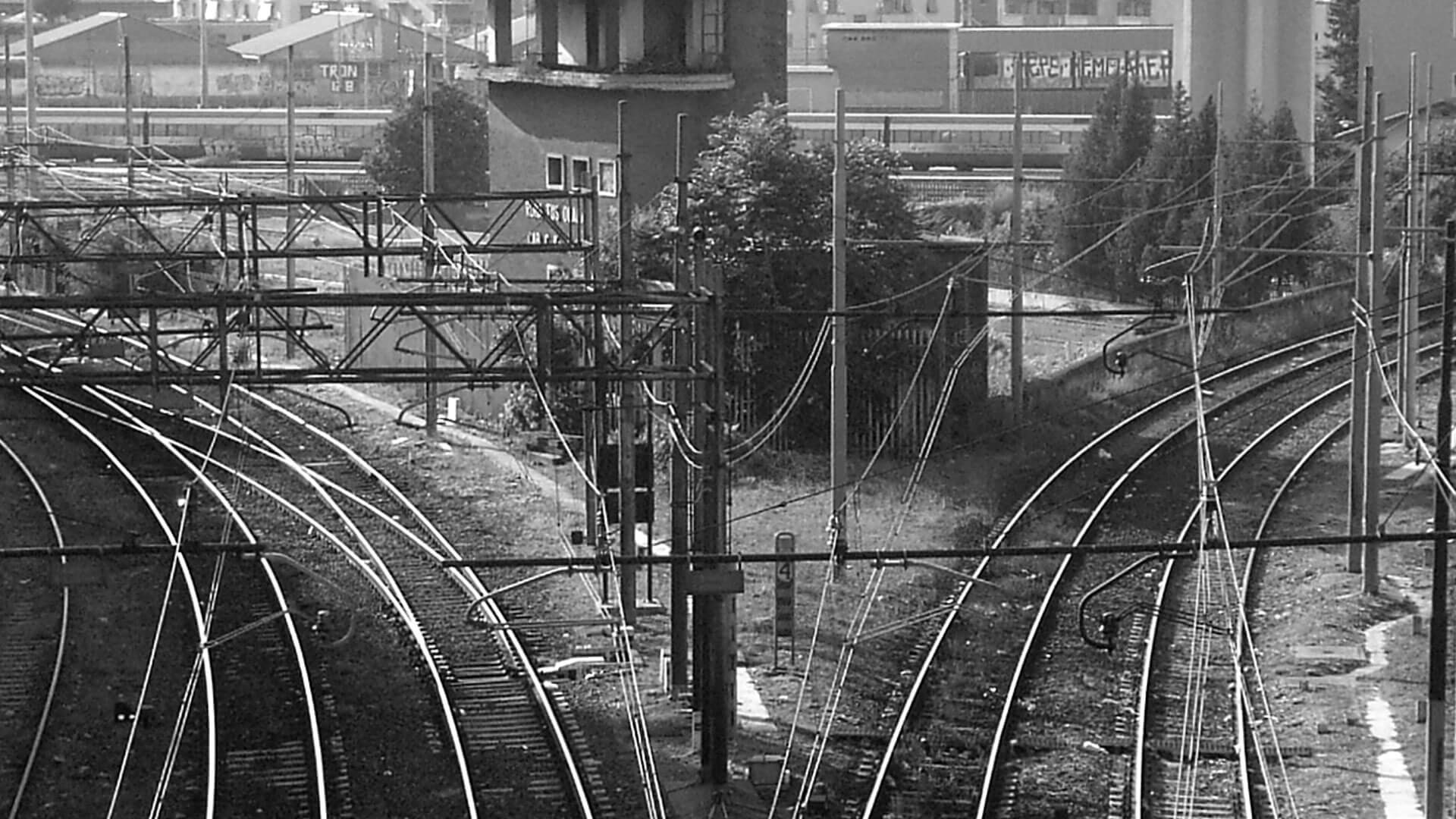 black and white image of railroad junction