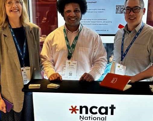 ncat members with lightbox presentation stand at CPC conference in London