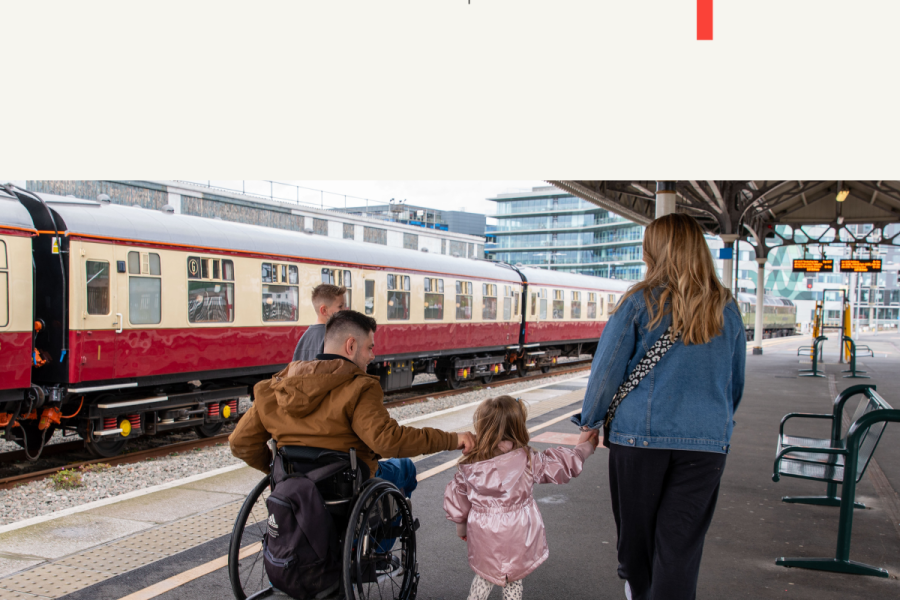 A family walks along a railway station platform. An adult wheelchair user moves alongside a woman and a young child holding hands, with a train stopped beside them on a train platform. The ncat logo and WSP logo branding appear on the top of the image.