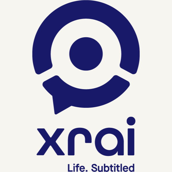 A logo of a white background with blue text with the words "XRAI. Life. Subtitled."